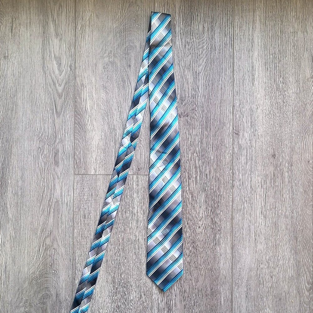 blue, white, silver and gray striped tie by Pierre Cardin